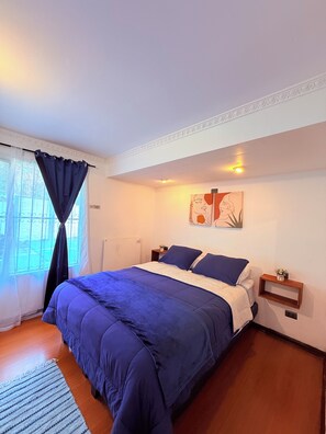 Basic Triple Room, Courtyard View | Iron/ironing board, free WiFi, bed sheets