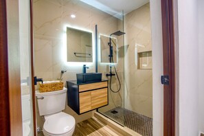 Shower, hair dryer, towels, soap