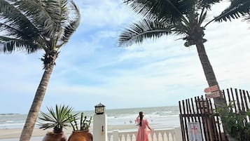On the beach, beach umbrellas, beach towels, beach massages