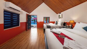 A hotel room with a wooden ceiling, a bed with white linens, a red accent wall, and a window with blinds. - Cat Ba Serena Homestay And Swimming Pool (Cat Hai)