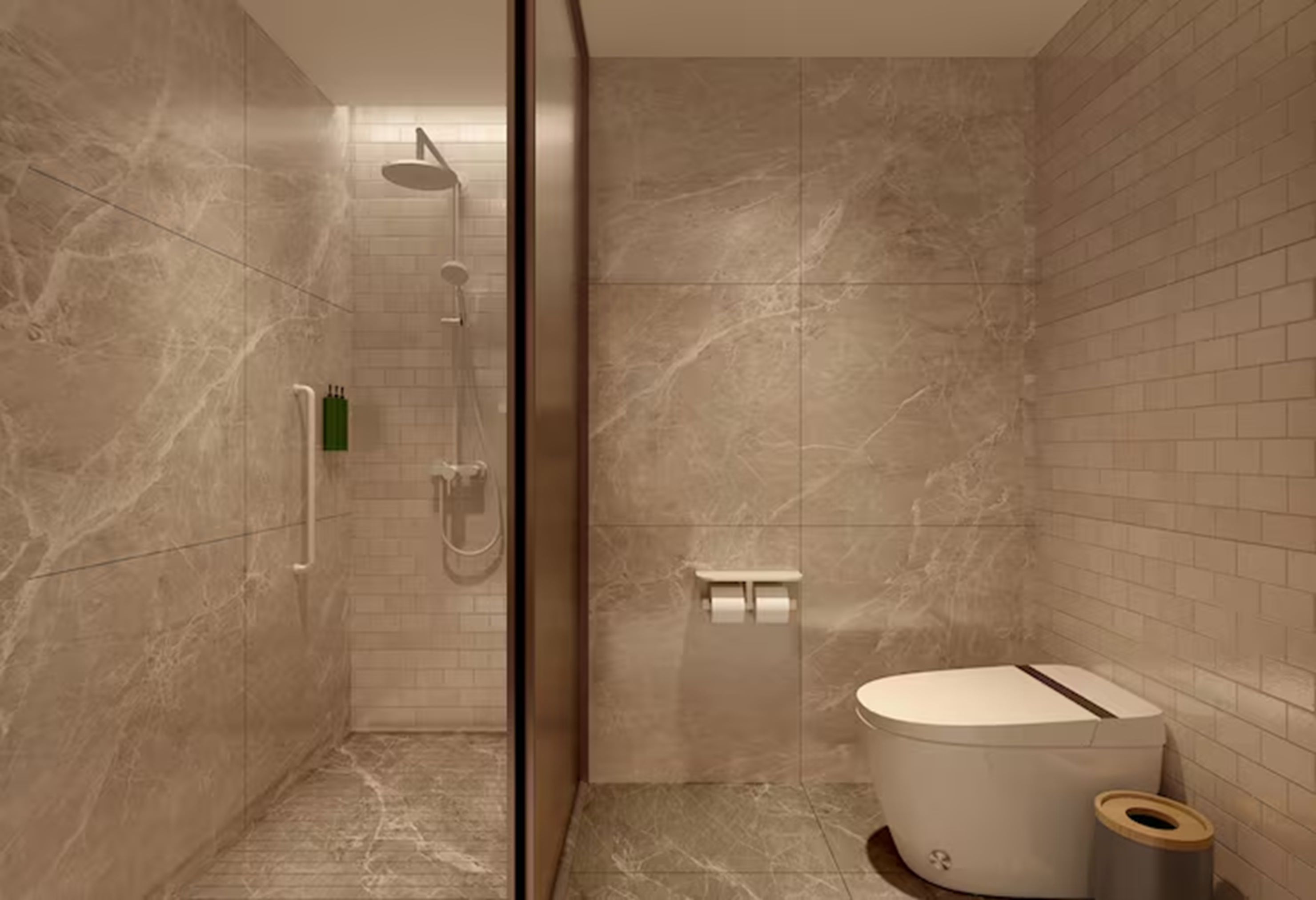 A modern bathroom with a glass shower enclosure, a toilet, and a small trash bin.