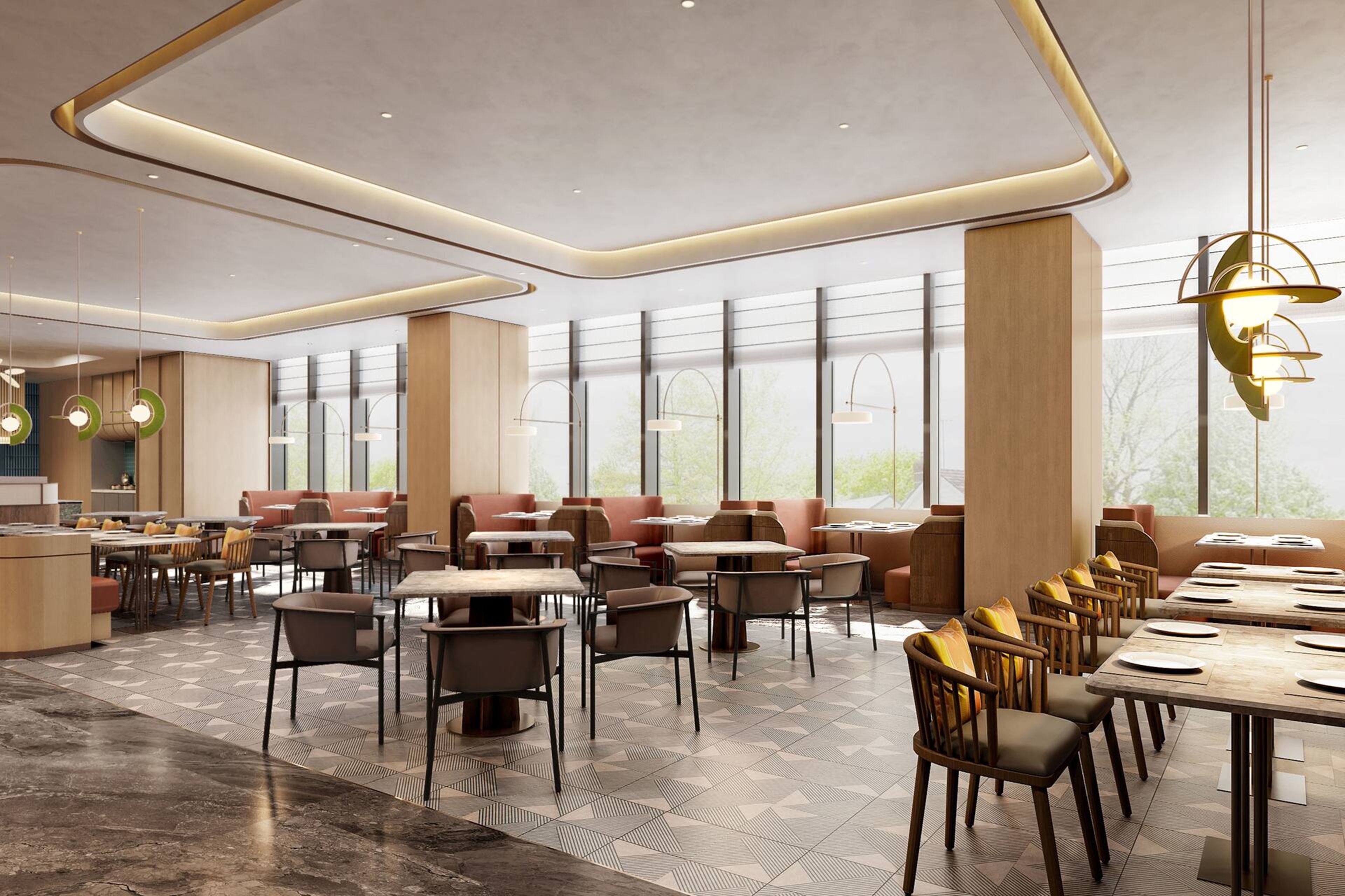 A modern restaurant with a geometric floor pattern, wooden tables and chairs, and large windows offering a view of the outdoors.