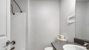 Shower, towels, soap, toilet paper