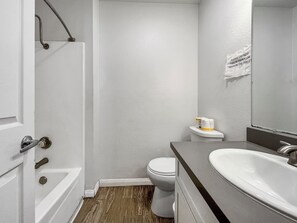 Shower, towels, soap, toilet paper