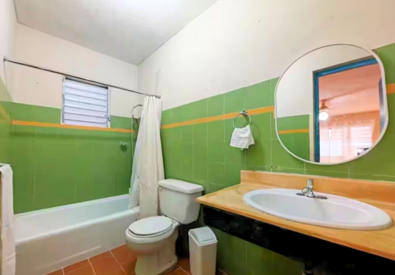 Bidet, towels, soap, toilet paper