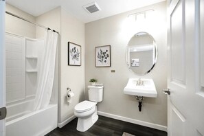 Hair dryer, towels, soap, toilet paper