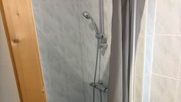 Shower, towels, toilet paper