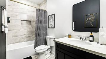 Hair dryer, towels, soap, toilet paper