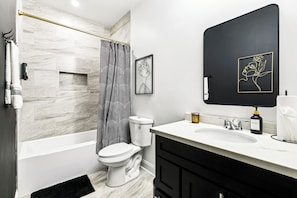 Hair dryer, towels, soap, toilet paper