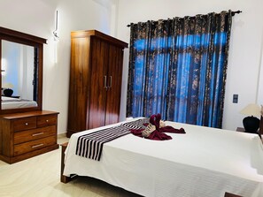 1 غرفة نوم ومكواة/لوح كي وواي فاي وملاءات أسرّة