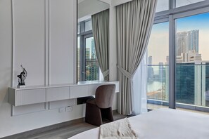 Premium Apartment, City View | Premium bedding, in-room safe, desk, laptop workspace - bnbme - Imperial Avenue - 2BR + Study Room (Dubai)