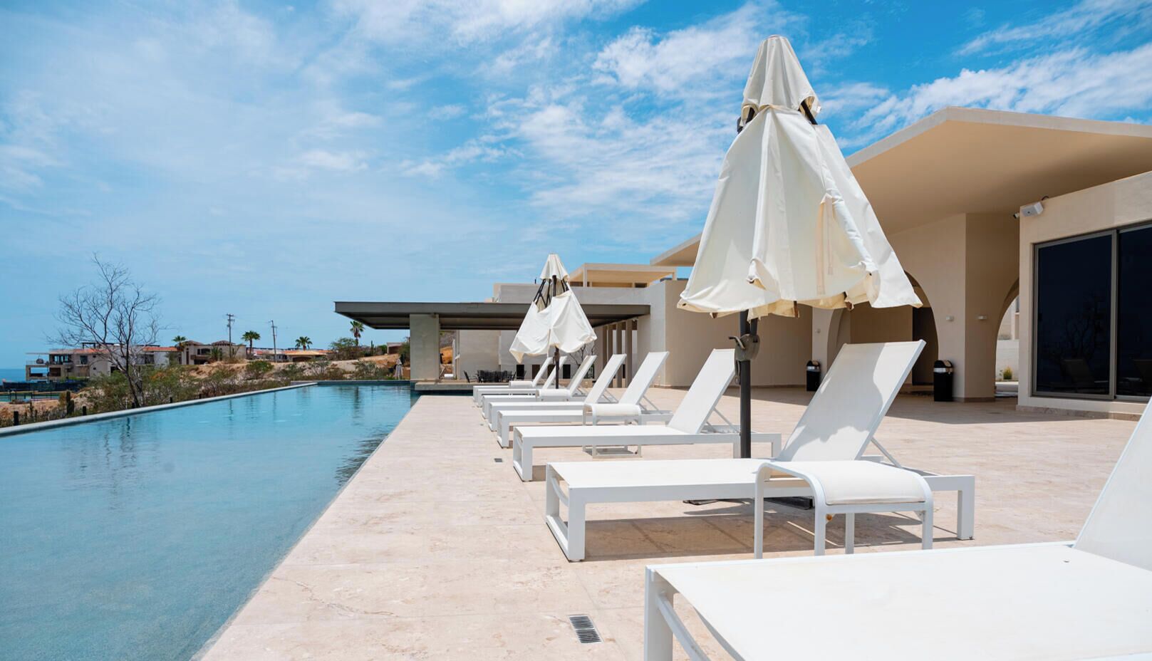 Outdoor pool, pool umbrellas, sun loungers