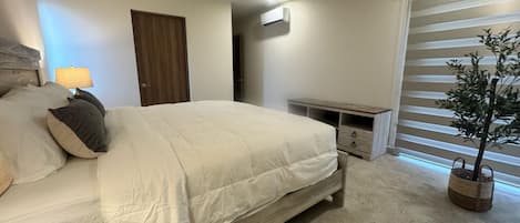 Deluxe Apartment, 2 Bedrooms, Partial Ocean View | Blackout drapes, free WiFi, bed sheets
