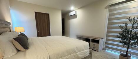 Deluxe Apartment, 2 Bedrooms, Partial Ocean View | Blackout drapes, free WiFi, bed sheets