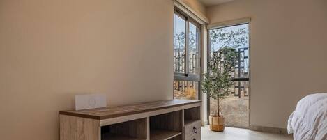 Deluxe Apartment, 2 Bedrooms, Partial Ocean View | Blackout curtains, free WiFi, bed sheets