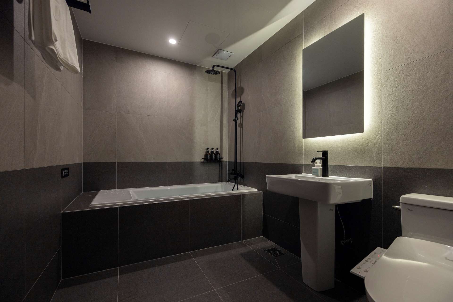 Business | Bathroom | Hair dryer, towels, soap, shampoo