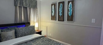 Modern 2BR Retreat | 85” TV Ultra-Comfy king Beds