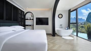 Deluxe Double Room, River View | Blackout curtains, iron/ironing board, free WiFi