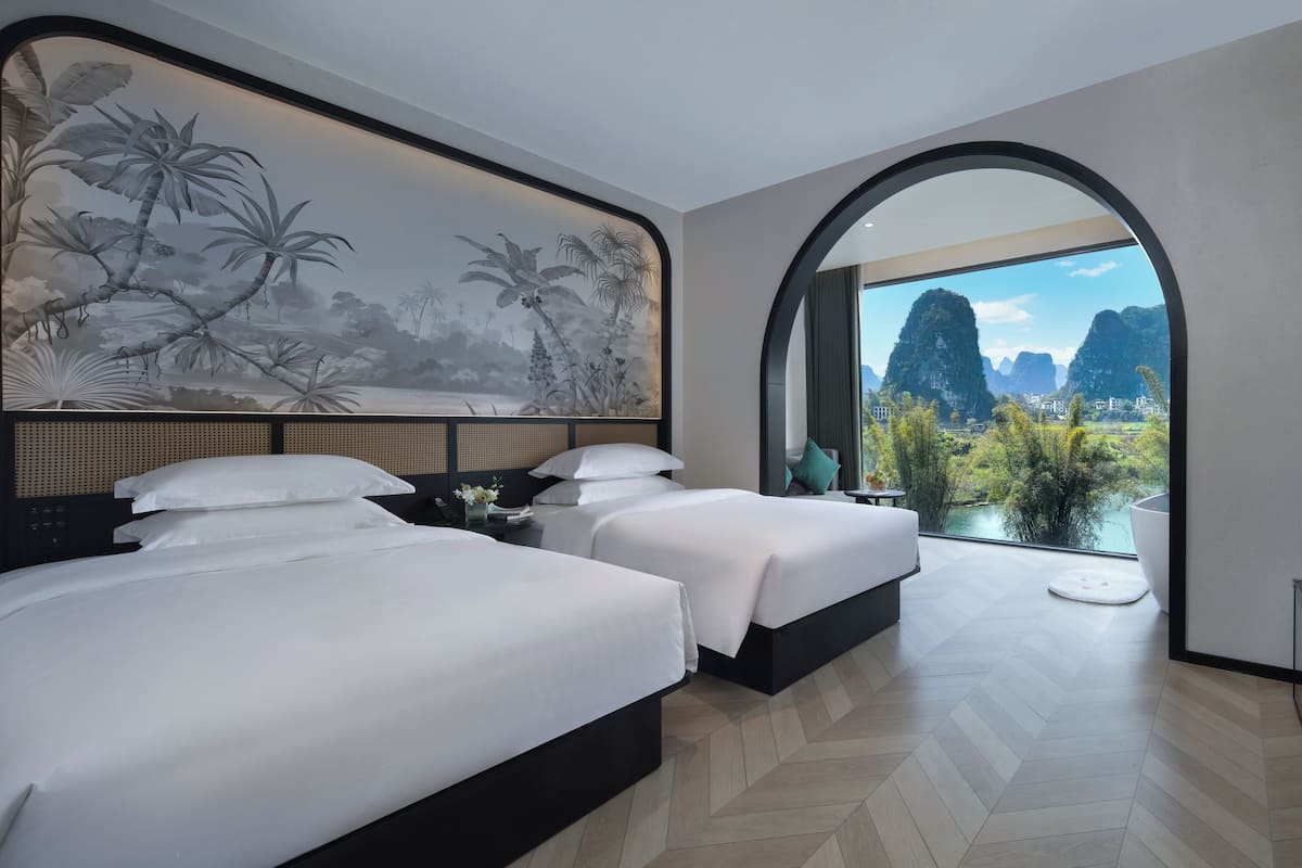 Deluxe Twin Room, River View | Desk, laptop workspace, blackout drapes, soundproofing