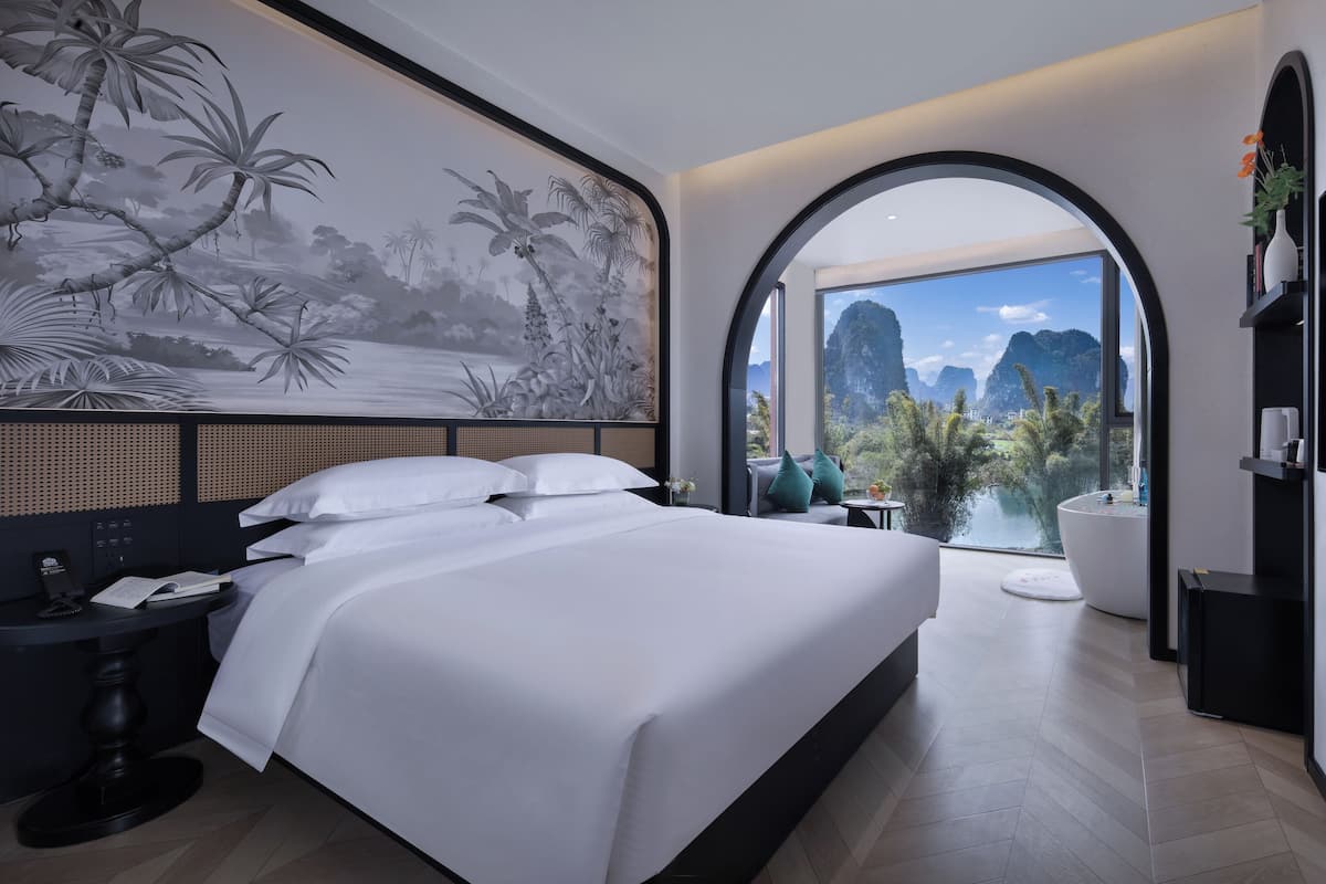 Luxury Double Room, River View | Desk, laptop workspace, blackout drapes, soundproofing