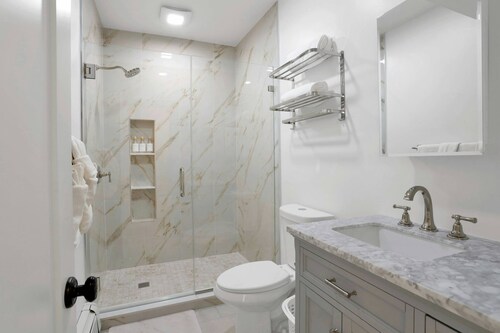 Stylish 3BR/2BA Retreat #3, Harbor Point – Walk to Train, Cafes & Restaurants, City + Shore