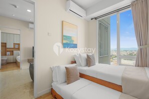 Apartment, 2 Bedrooms, City View | Desk, laptop workspace, iron/ironing board, free WiFi