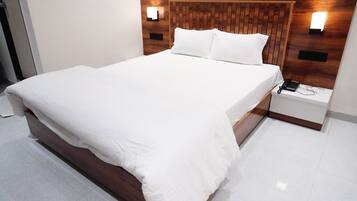 Premium bedding, desk, laptop workspace, free WiFi