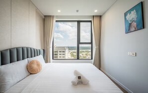 Family Suite, 3 Bedrooms, Club lounge access, City View | Egyptian cotton sheets, premium bedding, down duvets - Luxeasy Style By Lumiere Riverside (Ho Chi Minh)