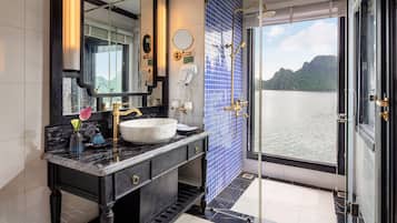 Shower, hair dryer, slippers, towels