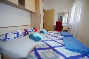 1 dormitorio, tabla de planchar con plancha, wifi gratis y ropa de cama