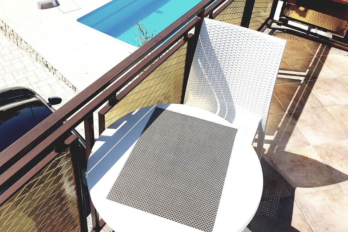 Classic Apartment, Pool View | Terrace/patio
