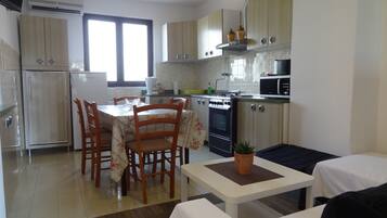 Family Apartment, Pool View | Private kitchen