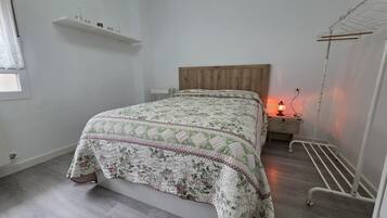 2 dormitorios, tabla de planchar con plancha, wifi gratis y ropa de cama