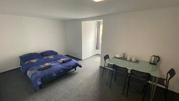 Classic fyrbäddsrum - 2 dubbelsängar | Skrivbord, strykjärn/strykbräda och gratis wi-fi