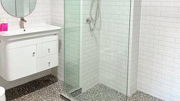 Shower, towels, soap, shampoo