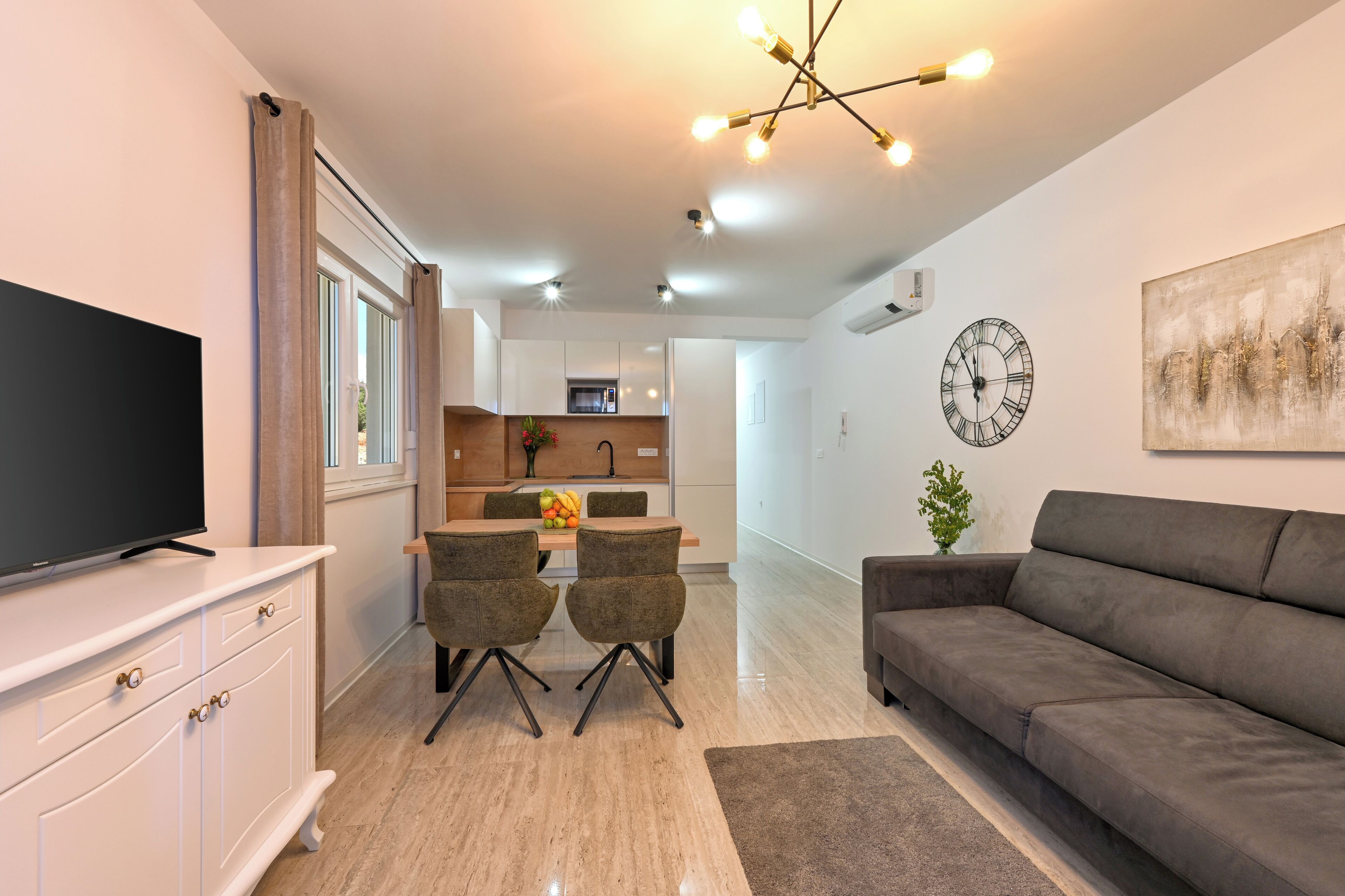 Appartement Deluxe, balcon, vue partielle sur la mer | Coin séjour