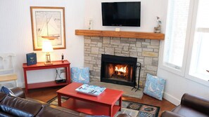 TV, fireplace - A Lakeside Retreat with Storybook Charm and Family Fun- 2 Bedroom Cottage (Branson)