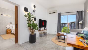 Comfort Apartment, Sea View | Living area | 55-inch LCD TV with digital channels, Netflix, streaming services