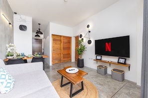 Comfort Apartment, Sea View | Living area | 55-inch LCD TV with digital channels, Netflix, streaming services