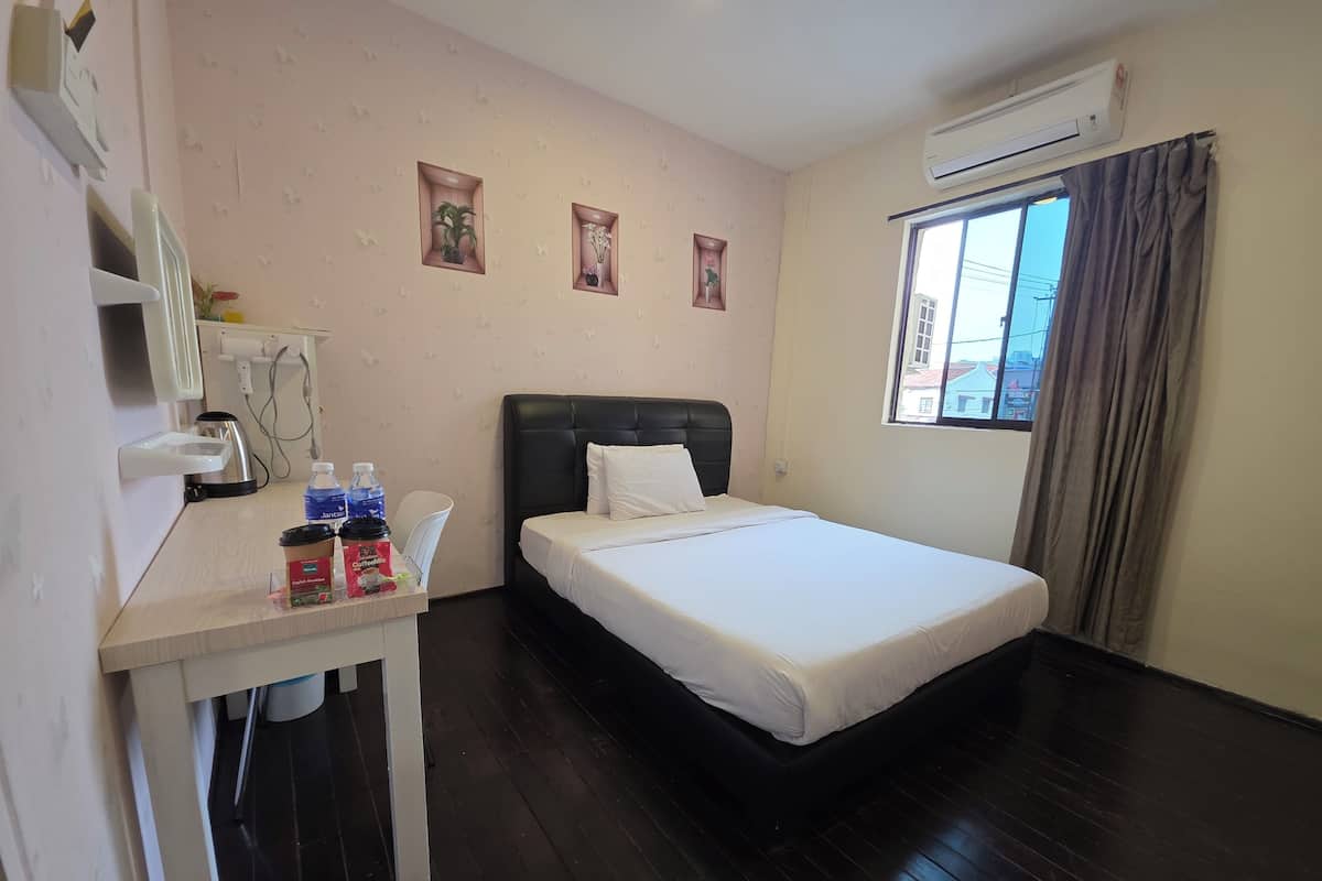 Standard Room, City View | Down duvets, individually decorated, individually furnished, desk
