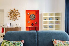 Departamento, 1 habitación, vista al océano | Sala de estar | Libros 