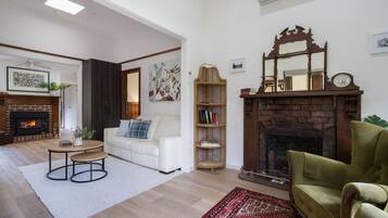 TV, fireplace, books