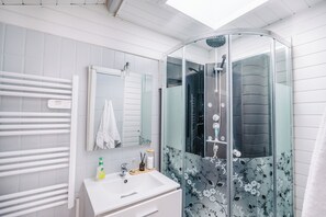 Shower, hair dryer, towels, soap