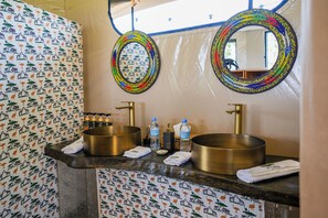 Shower, free toiletries, slippers, towels