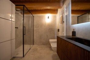 Shower, free toiletries, hair dryer, slippers