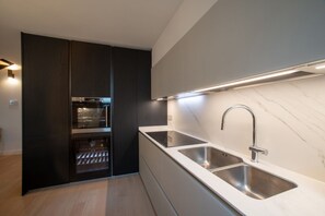 Fridge, stovetop, dishwasher, electric kettle