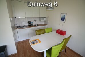 Fridge, stovetop, coffee/tea maker, electric kettle