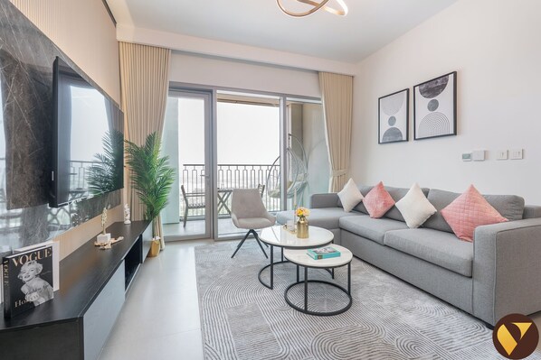 Appartement Luxe, balcon, vue ville | Coin séjour