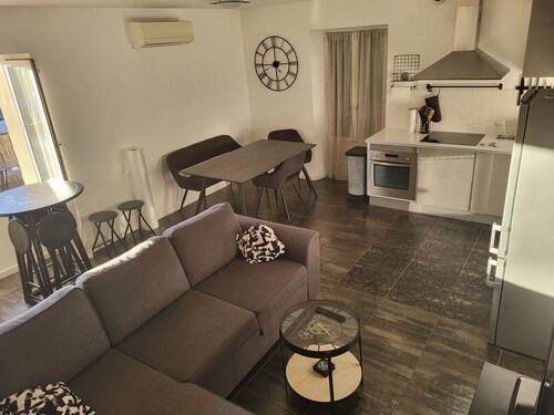 Village house opposite the port and 50 m. from the beach.