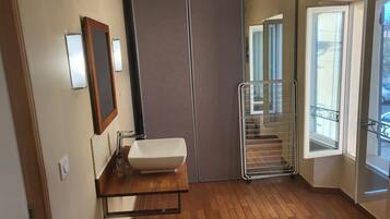 Shower, hair dryer, towels, toilet paper